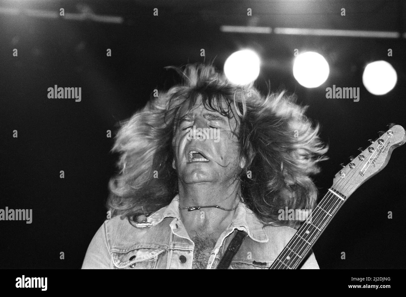 Rick Parfitt von der Rockgruppe Status Quo, im Konzert in Wien, Österreich. 8. Mai 1986. Stockfoto