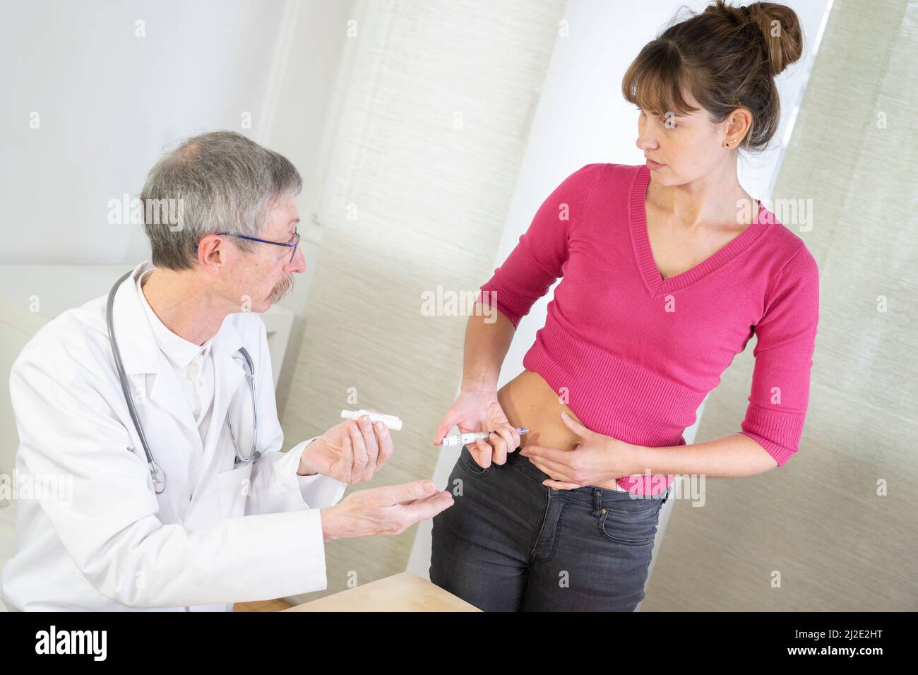 Diabetische Frau mit Arzt Stockfoto