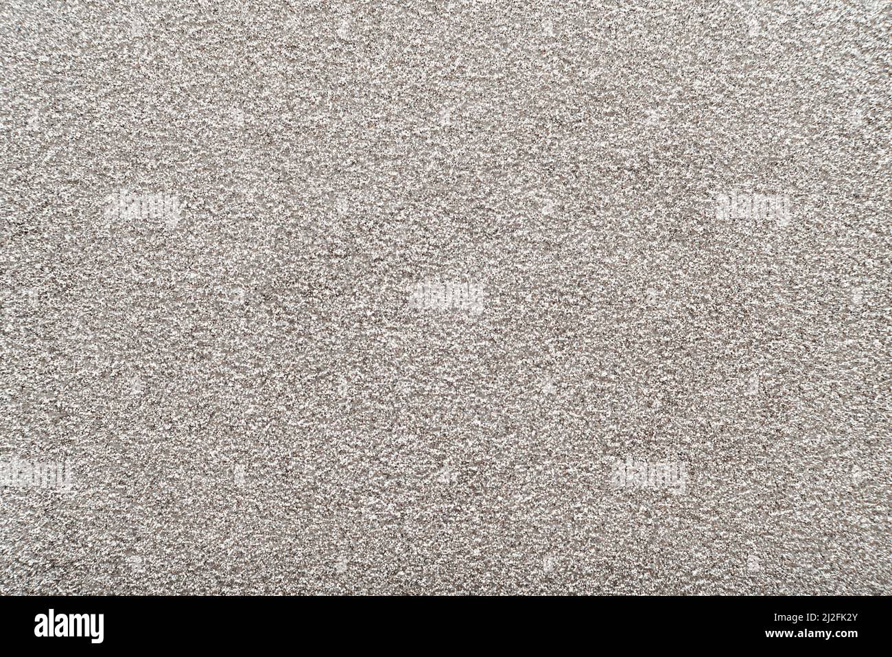 Hintergrund in silbernem Stoff. Material oder Struktur Stahl Farbe. Abstraktionsmatte Stockfoto