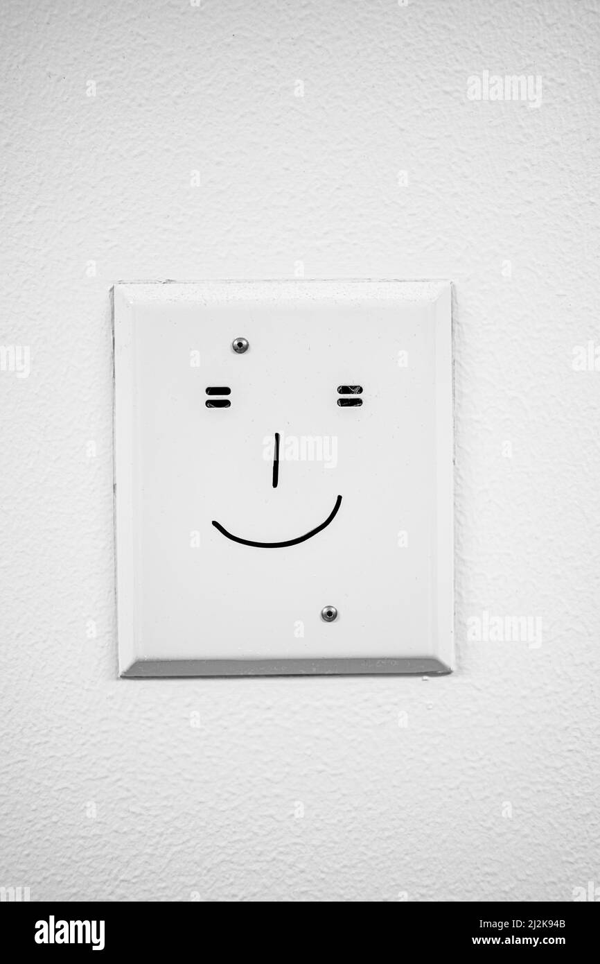 Elektrische Verbindung mit freundlichem Gesicht Stockfoto