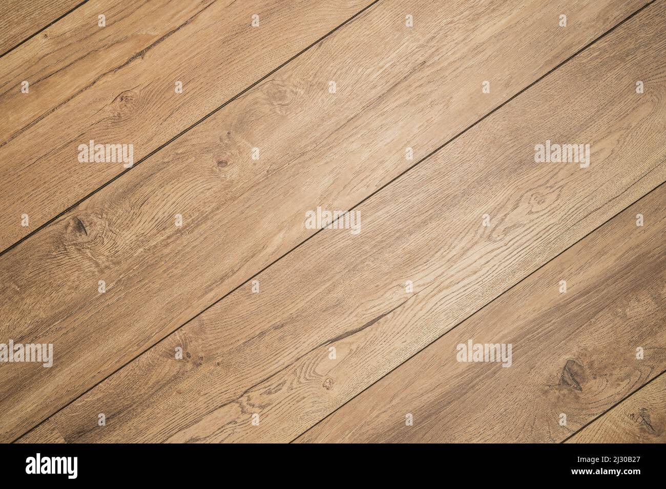 Ein Foto von einem hellen Holzhintergrund Stockfoto