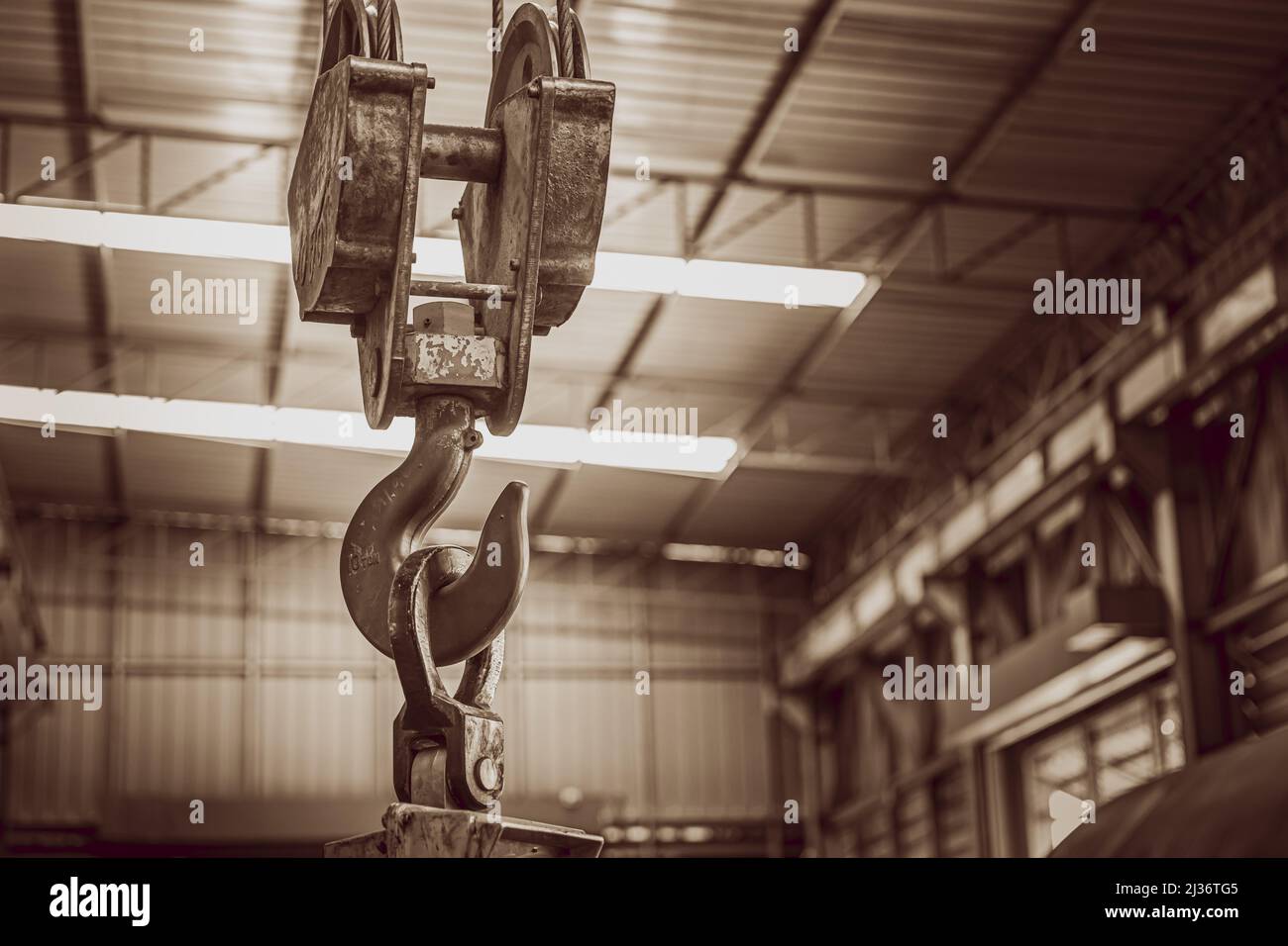 Hebekran Haken in Fabrik Lager braun vintage Farbe Ton Stockfoto