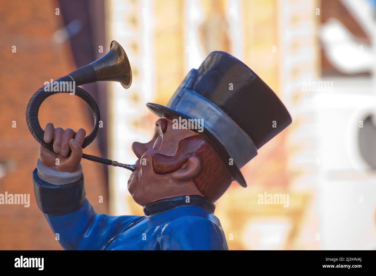 Figur eines Postilions, bläst er sein Horn, Mittenwald, Oberbayern Stockfoto