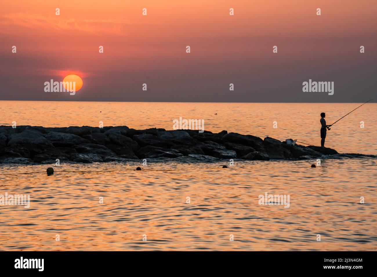 Mensch und Mutter Natur, Sonnenuntergangsszenerie Stockfoto
