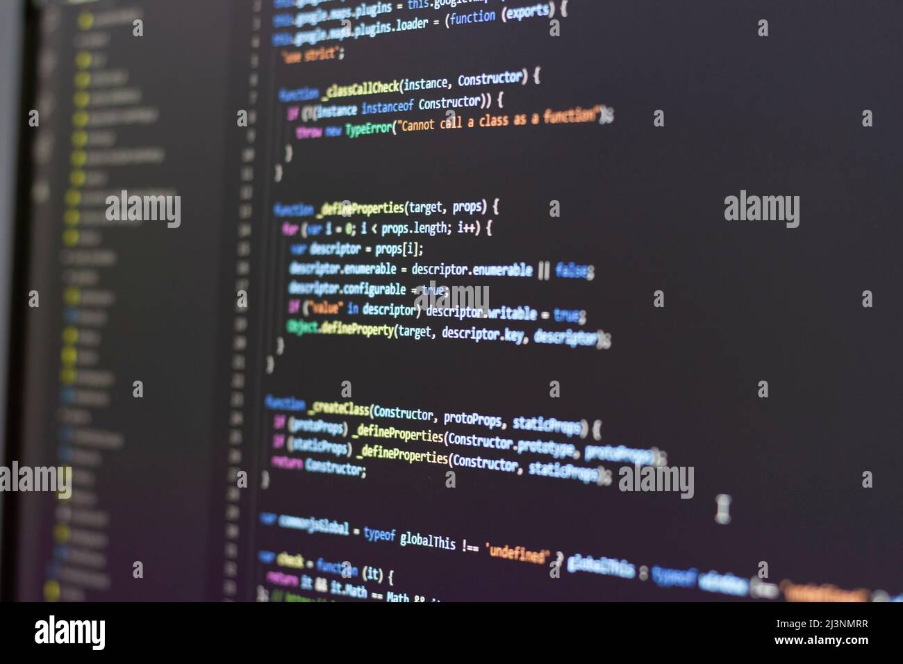 Technologieentwicklung mit javascript-Code auf dem Computerbildschirm. Kann als Hintergrund verwendet werden Stockfoto