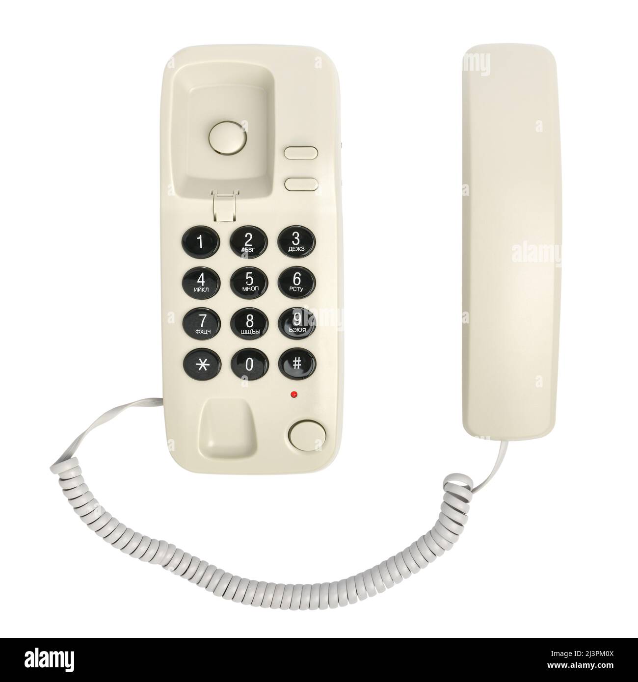 Kleines Festnetztelefon mit dem russischen Alphabet auf den Tasten, isoliert auf einem weißen Hintergrund Stockfoto