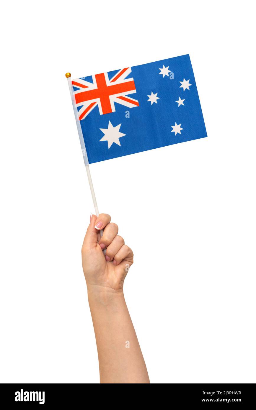 Weibliche Hand mit australischer Flagge, isoliert auf weißem Hintergrund Stockfoto