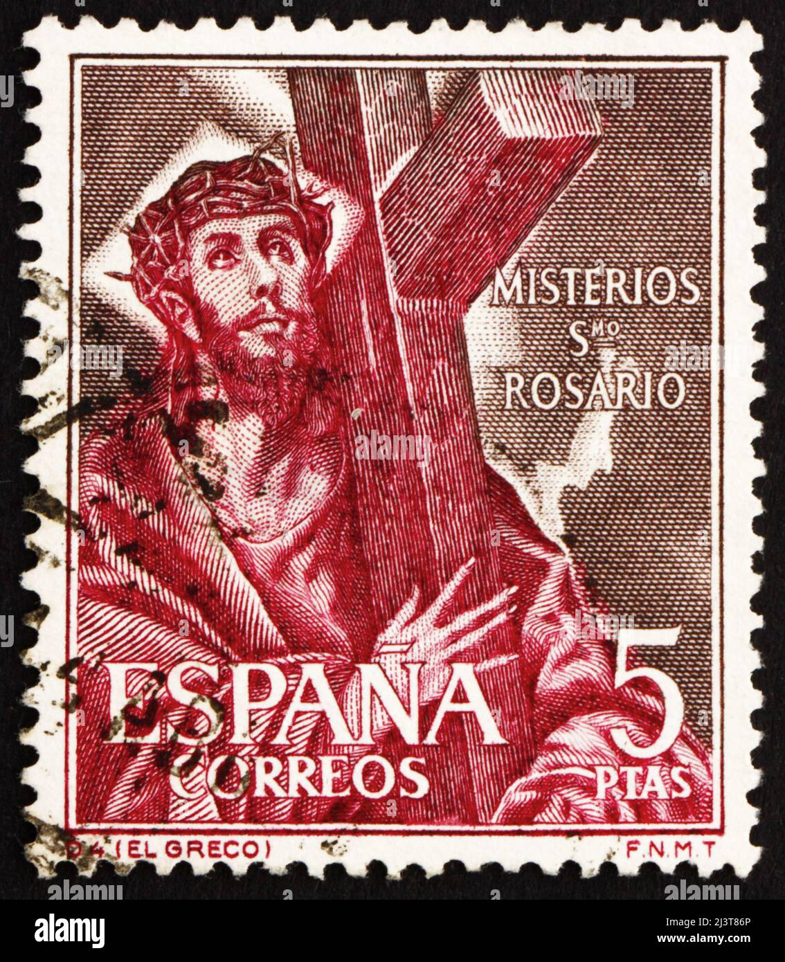 SPANIEN - UM 1961: Eine in Spanien gedruckte Marke zeigt Jesus Christus, der das Kreuz trägt, um 1961 Stockfoto