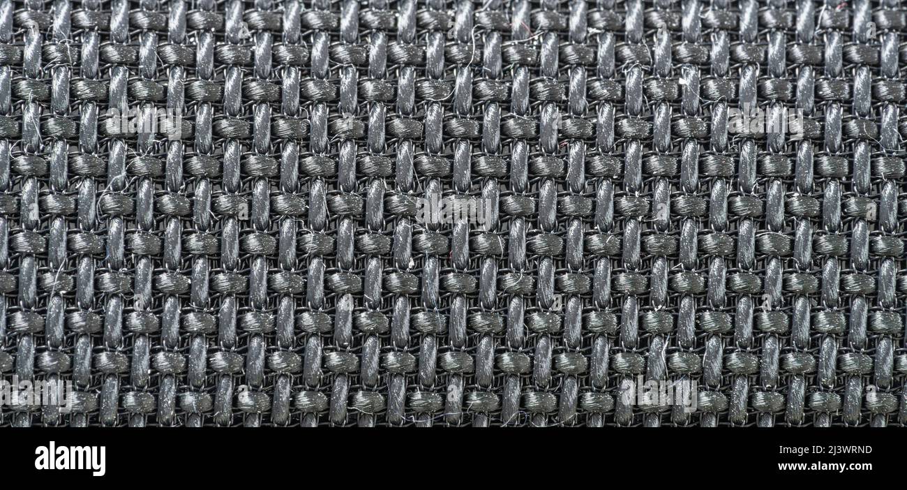 Makrotextur auf synthetischem Gewebe am Griff Stockfoto