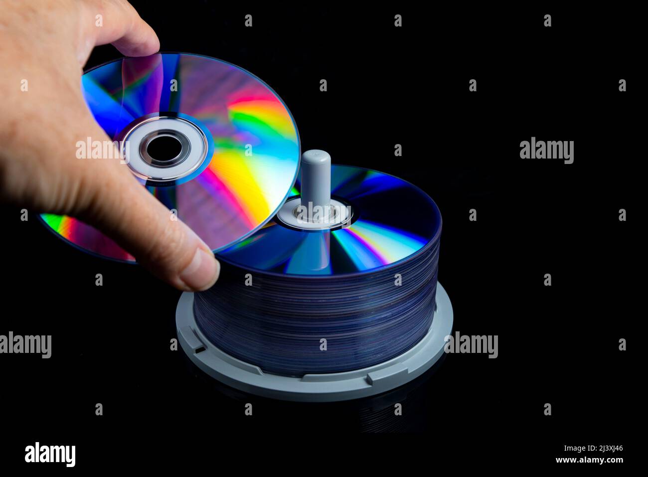 Hand mit einer leeren CD oder DVD Stockfoto
