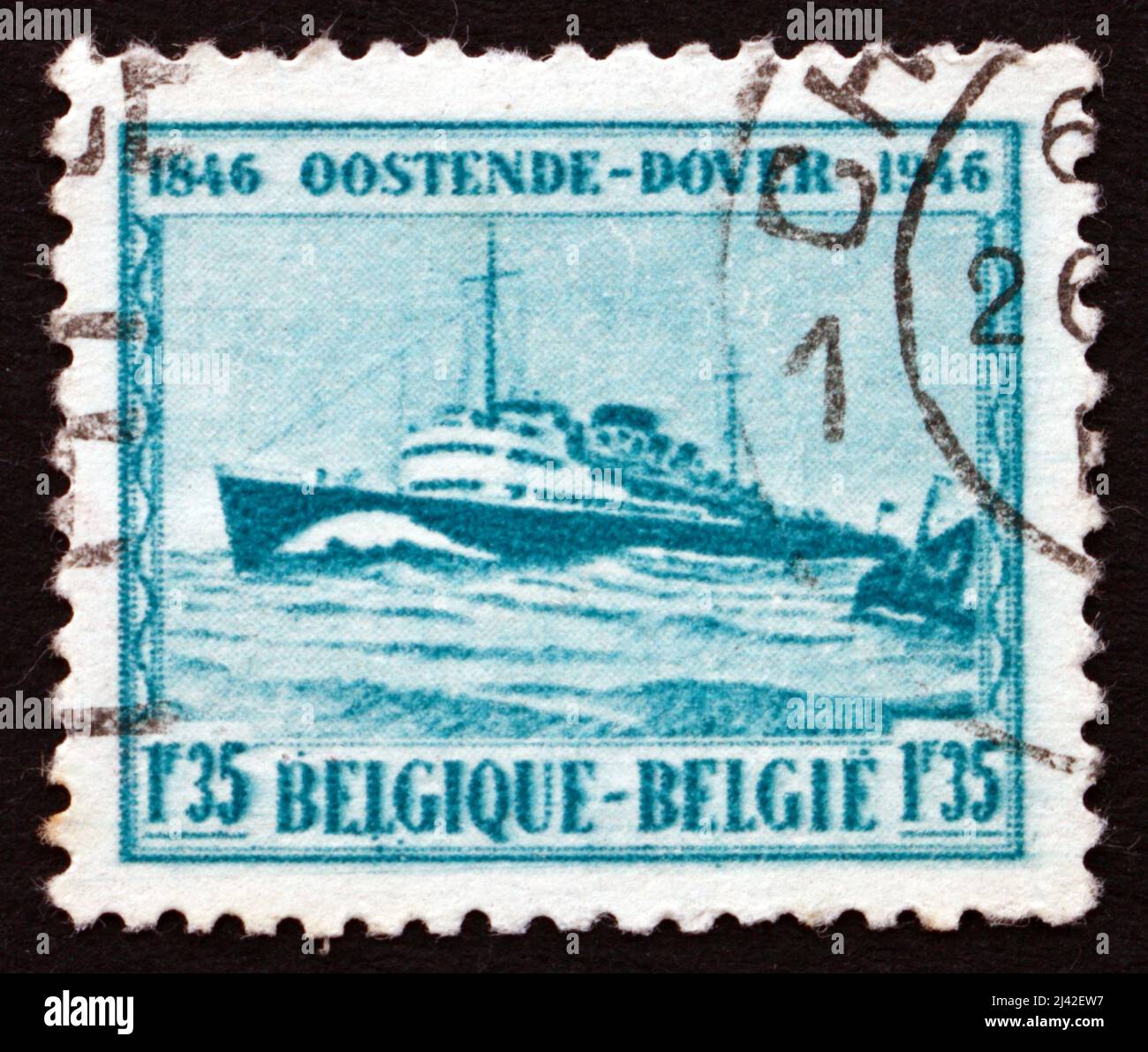 BELGIEN - UM 1946: Eine in Belgien gedruckte Briefmarke zeigt M. S. Prinz Baudouin, 100. Jahrestag der Dampfschifffahrt zwischen Ostende und Dover, um 1946 Stockfoto