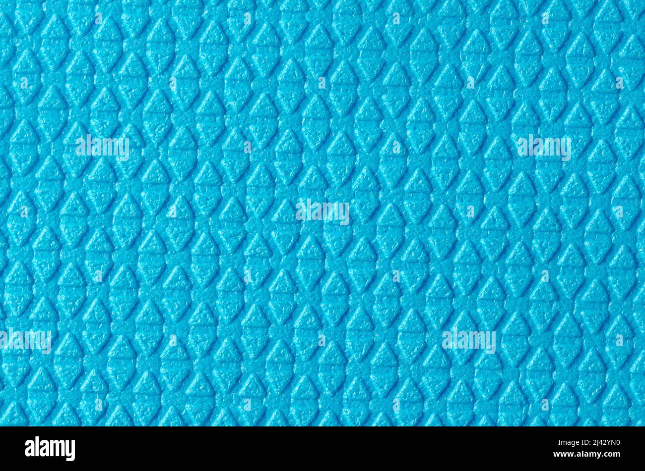 Hintergrund mit grober Textur aus blauen Rautendreiecken. Stockfoto
