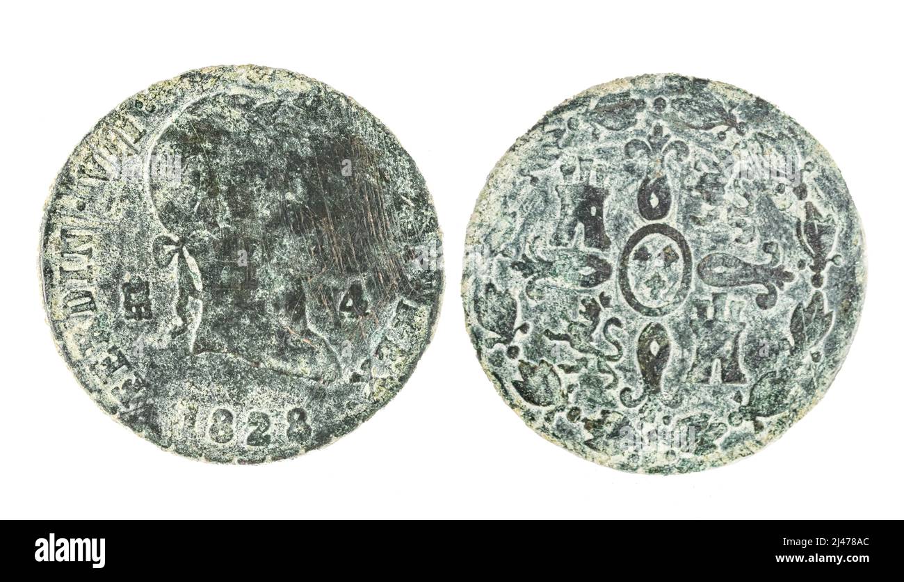 Spanische Münzen - 4 Maravedis, Ferdinand VII. 1828 in Bronze geprägt Stockfoto