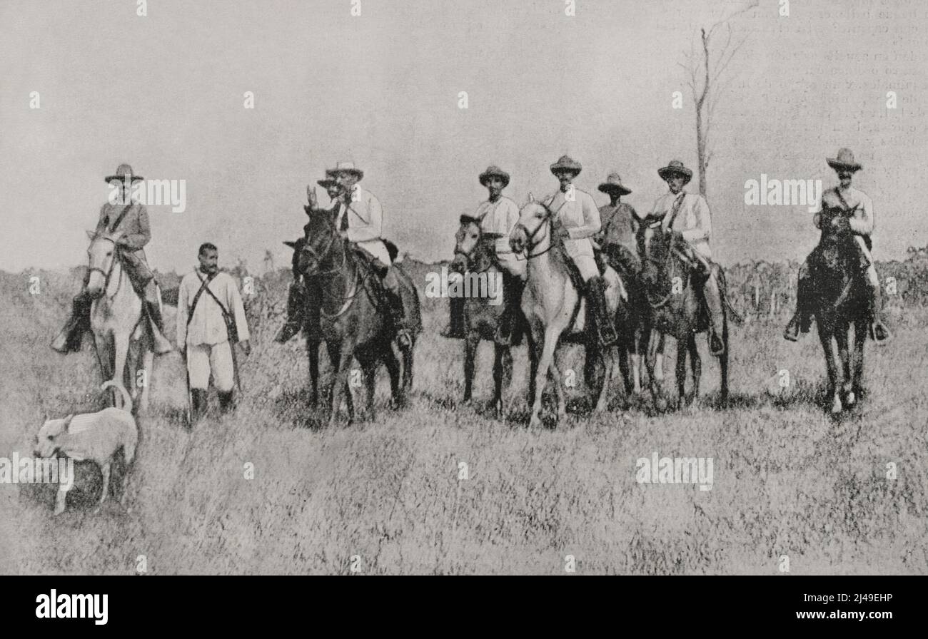 Kubanischer Unabhängigkeitskrieg (1895-1898). Insel Kuba. General Bartolomé Masó (1830-1907). Präsident der Kubanischen Waffenrepublik (1897-1898). Präsident Masó mit seiner Begleitung. Fotogravur von Laporta. La Ilustración Española y Americana, 1898. Stockfoto