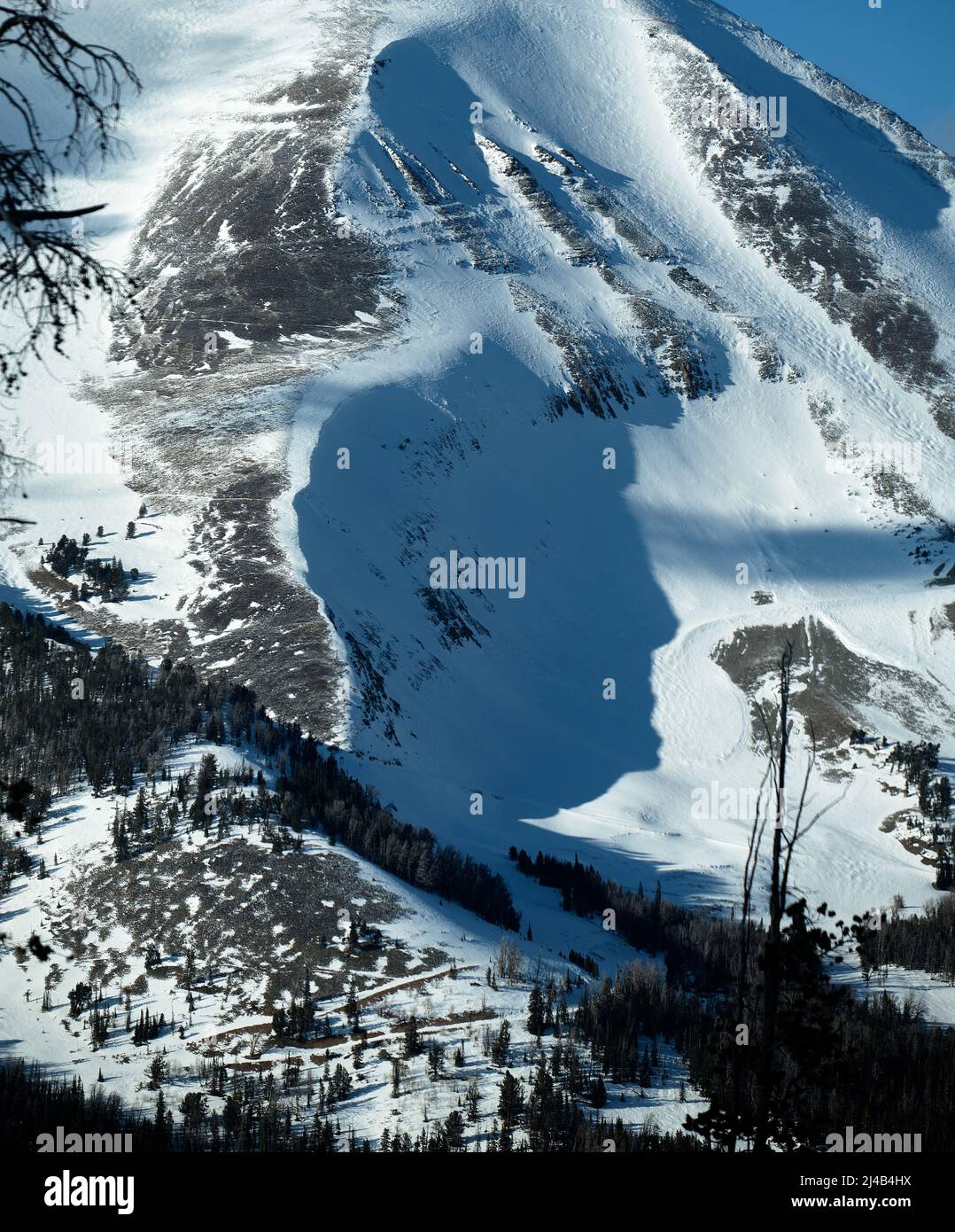 Schatten des Kopfes eines Mannes auf Lone Peak, Big Sky, Montana Stockfoto