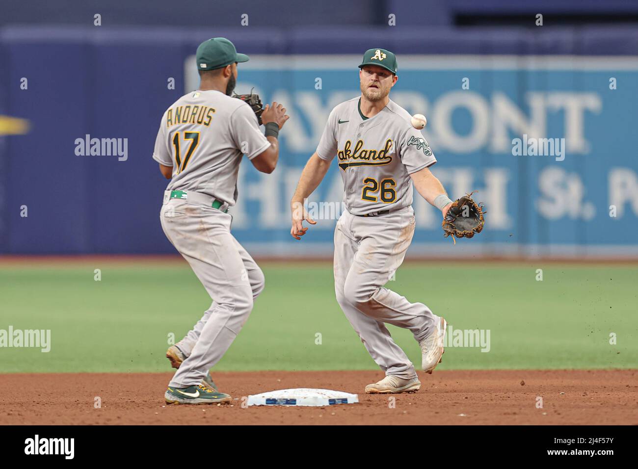 St. Petersburg, United States. 14th Apr, 2022. St. Petersburg, FL. USA;  Oakland Athletics center fielder Cristian Pache (20) and left fielder Chad  Pinder (10) chest bump during pregame warmups prior to a