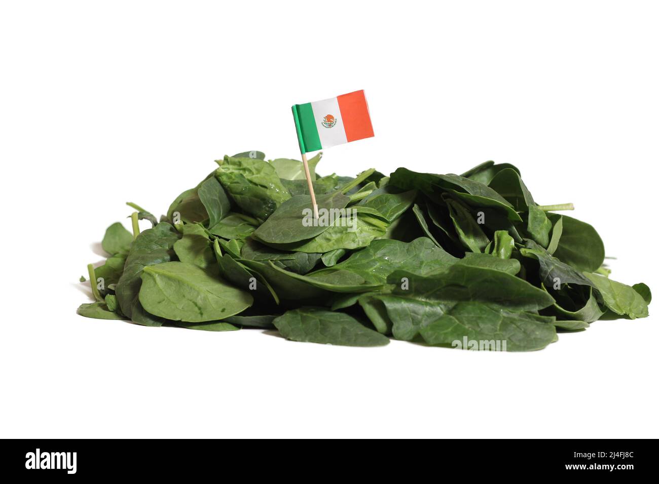 Spinatblätter mit Flagge von Mexiko isoliert auf Weiß Stockfoto