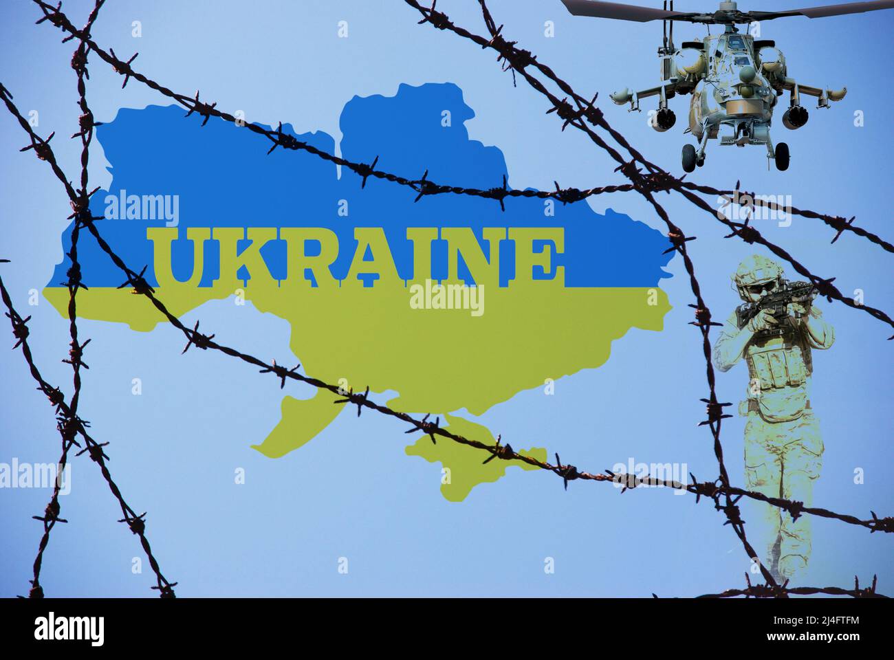 Krieg in der Ukraine, Stacheldraht, ukrainische Flagge, Angriff auf die Ukraine durch russische Soldaten und Hubschrauber. Bedrohung für Europa Stockfoto