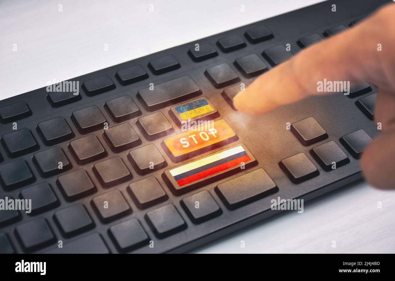 Stop-Taste auf einer Computer-Tastatur, Bitte stoppen Sie den schwelenden Krieg von Russland und der Ukraine Stockfoto