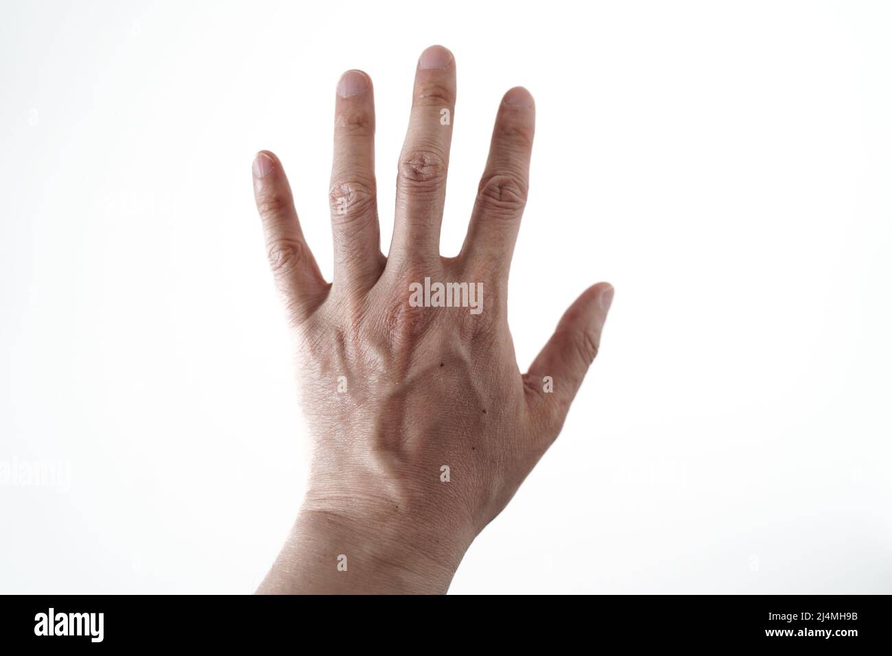 Männlich linke Hand auf weißem Hintergrund Stockfoto