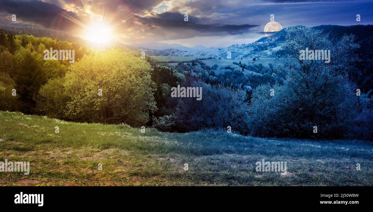 Tag- und Nachtwechsel in den karpaten. Wunderschöne Naturkulisse im Frühling. Landschaft mit frischen grünen Wiesen und Wald mit Sonne und Mond Stockfoto
