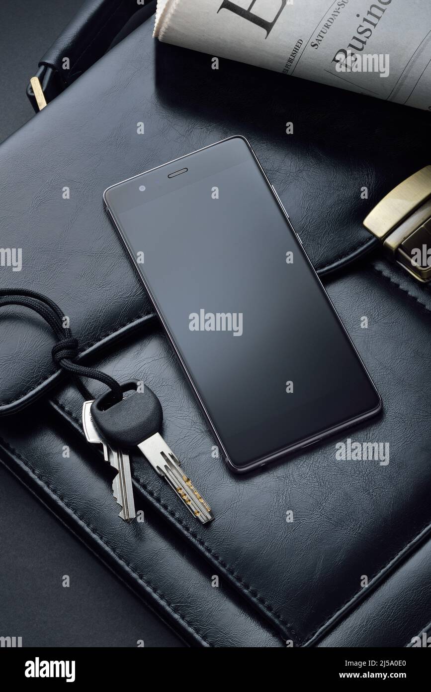 Ein Mobiltelefon, auf dem geschäftliche oder geschäftliche Informationen eingefügt werden können. Stockfoto