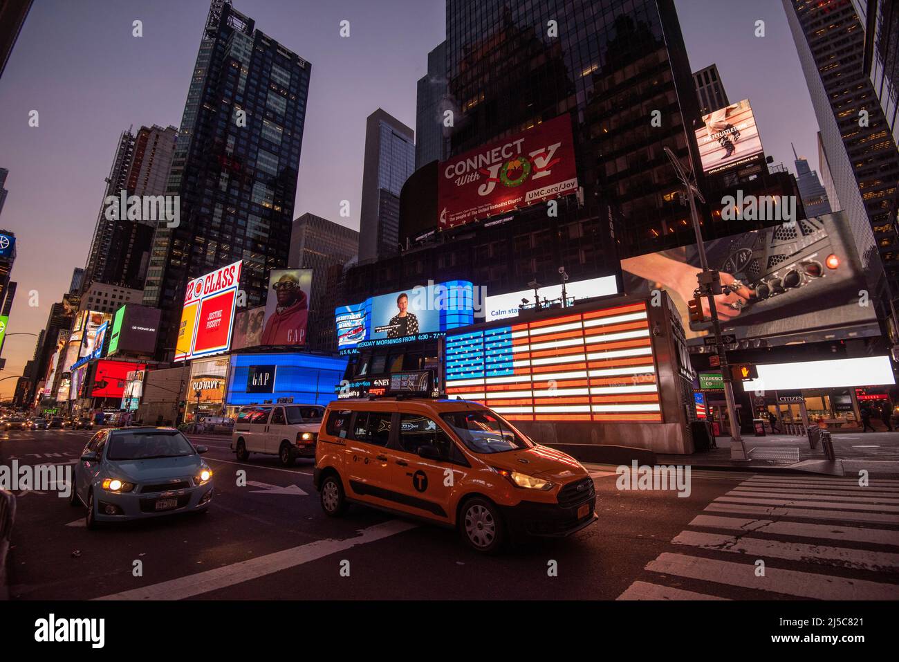 Sonnenaufgang am Times Square, Midtown Manhattan, New York USA Stockfoto