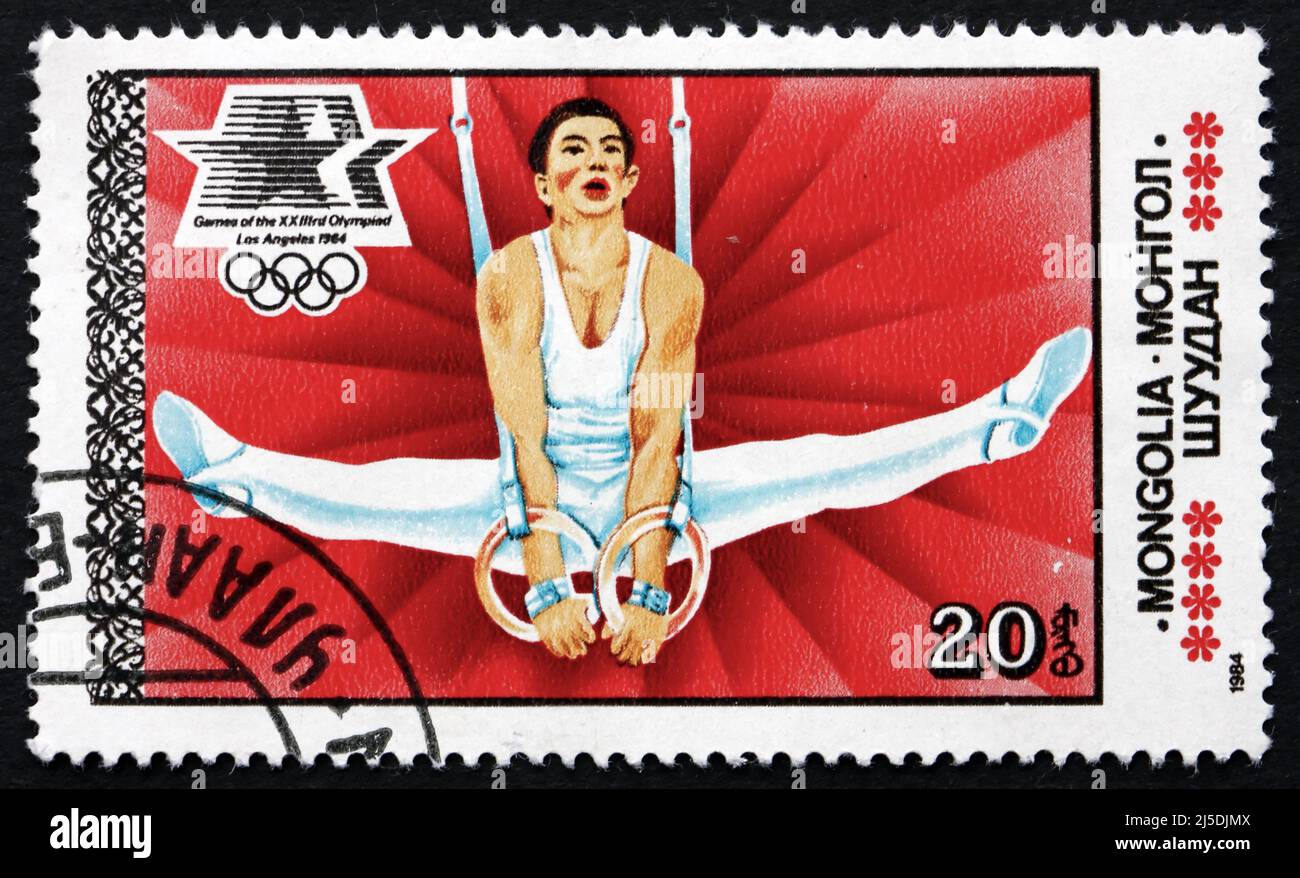 MONGOLEI - UM 1984: Eine in der Mongolei gedruckte Briefmarke zeigt Gymnastik, Olympische Sommerspiele 1984, Los Angeles, um 1984 Stockfoto