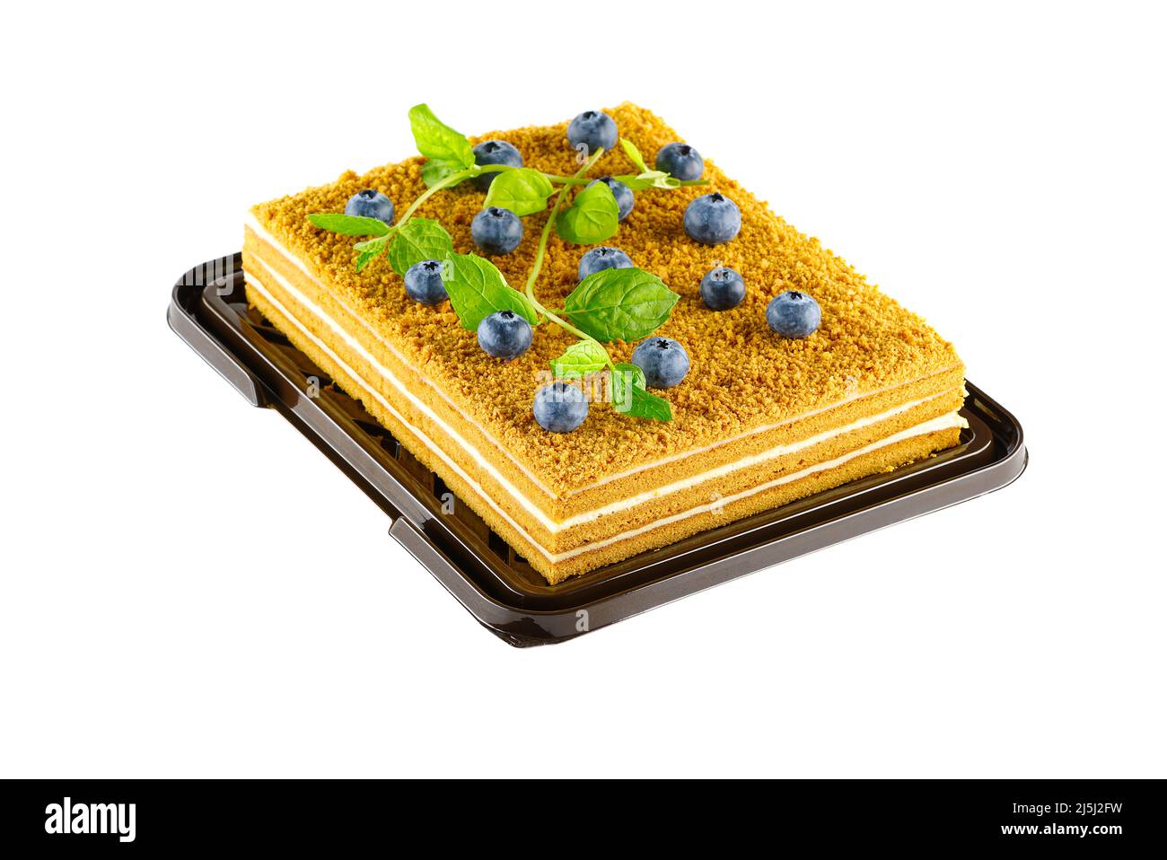 Honigkuchen Dessert, quadratische Honigkuchen isoliert auf weißem Hintergrund Stockfoto