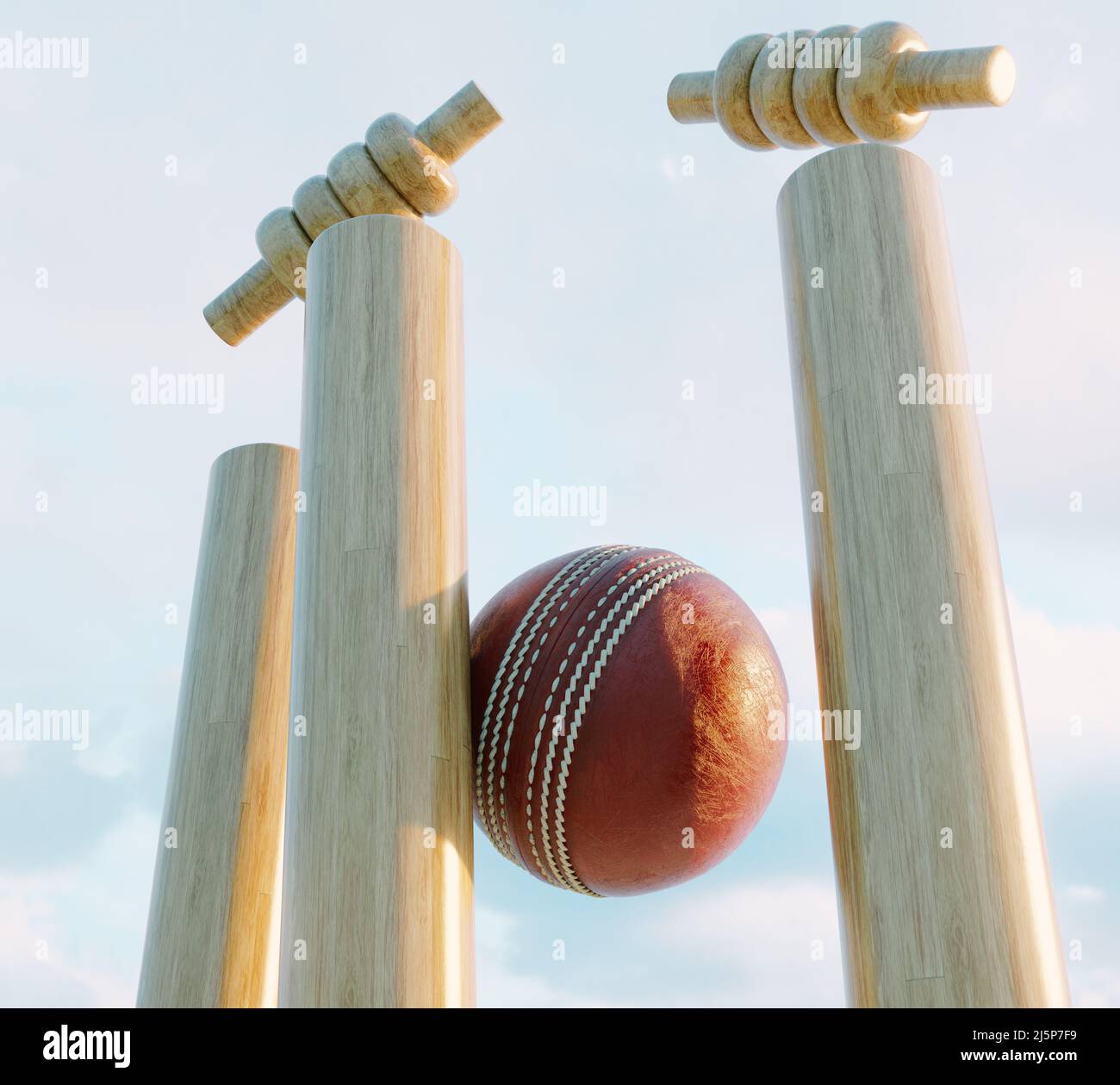 Hölzerne Cricket-Wickets mit auslegenden Bällen auf dem Hintergrund des Tageshimmels - 3D rendern Stockfoto