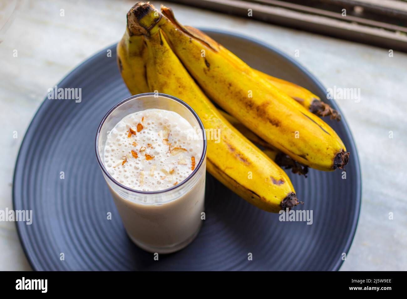 Selektiver Fokus des Bananenmilchshake. Stockfoto