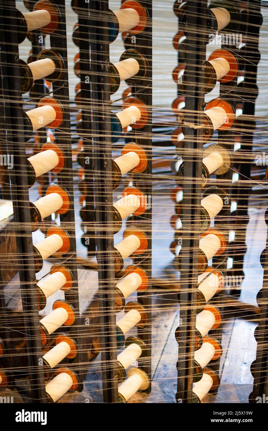 Maschinen in einer alten Baumwollfabrik. Stockfoto