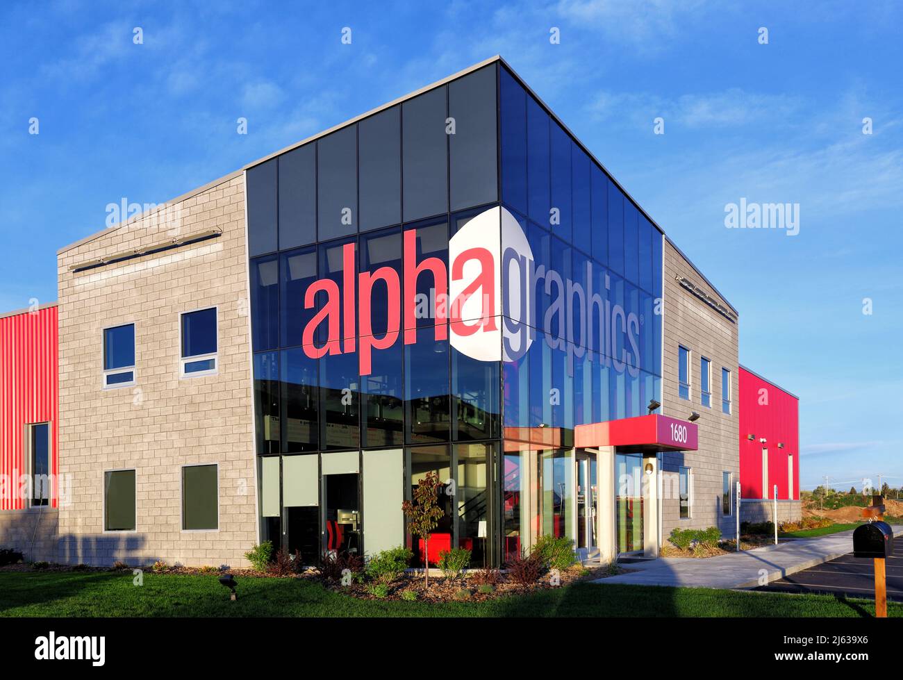Außenarchitektur eines Alpha Graphics Stores. Stockfoto