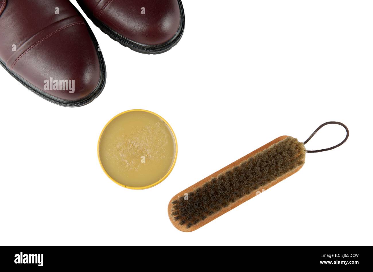 Nahaufnahme von Schuh- und Schuhpflegezubehör: Wachs und Pinsel Stockfoto