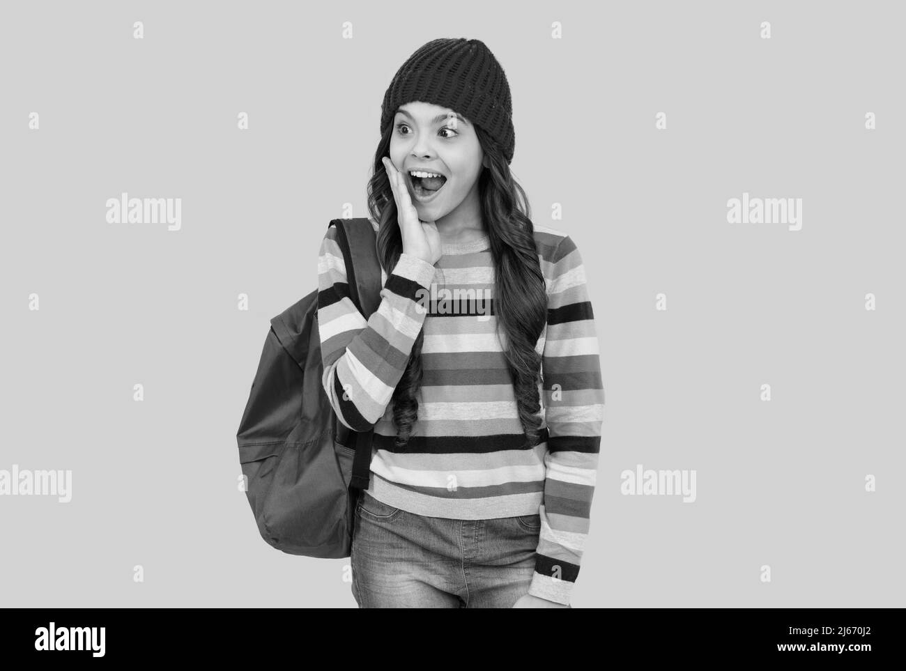 Überrascht Hipster teen Mädchen mit Rucksack gehen zur Schule, Überraschung Stockfoto