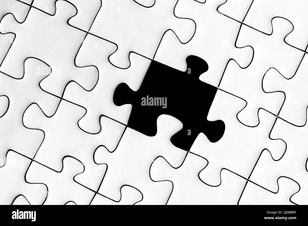 Jig Säge Puzzle mit einem fehlenden Stück Stockfoto