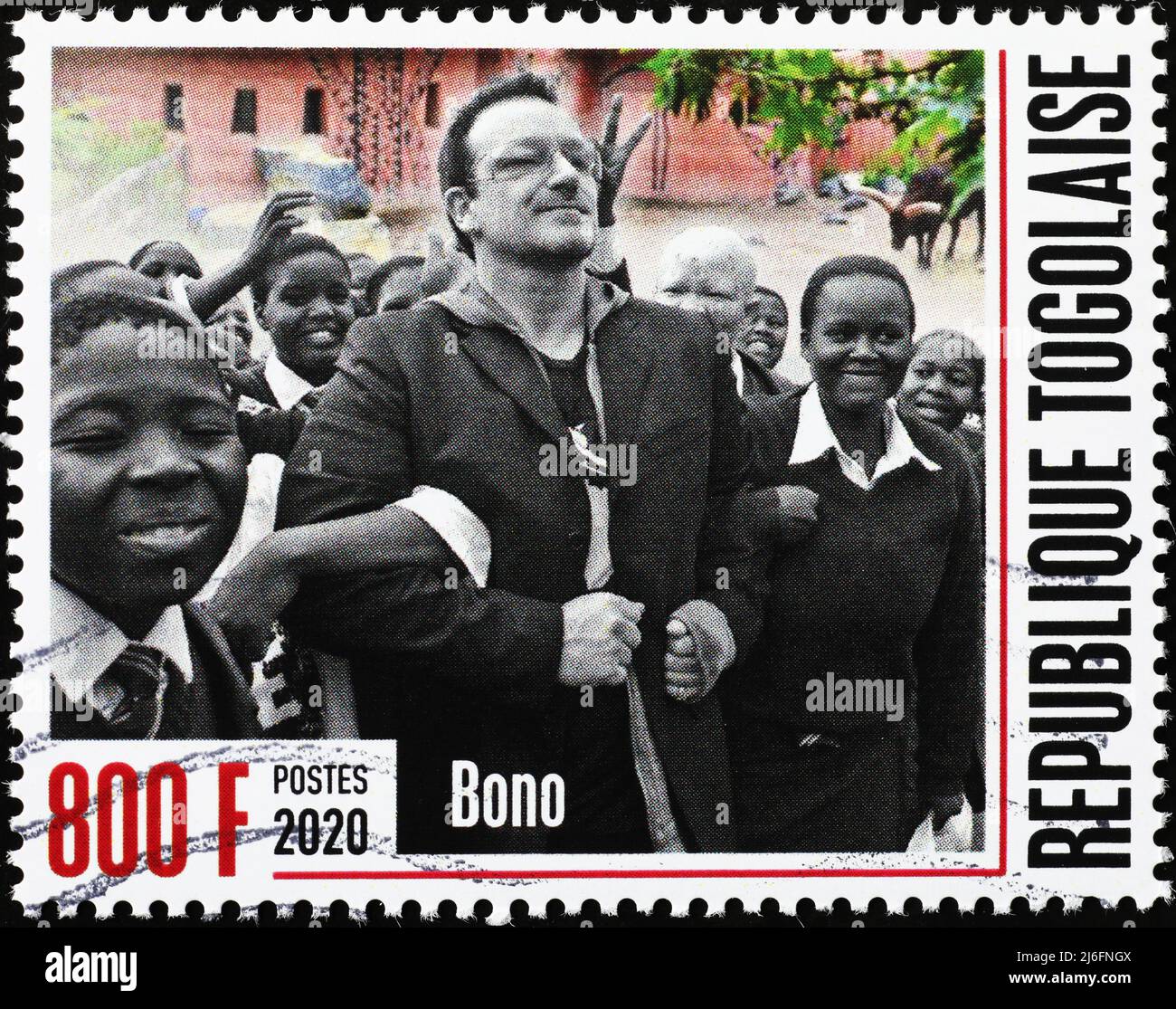 Bono mit afrikanischen Kindern auf Briefmarke Stockfoto