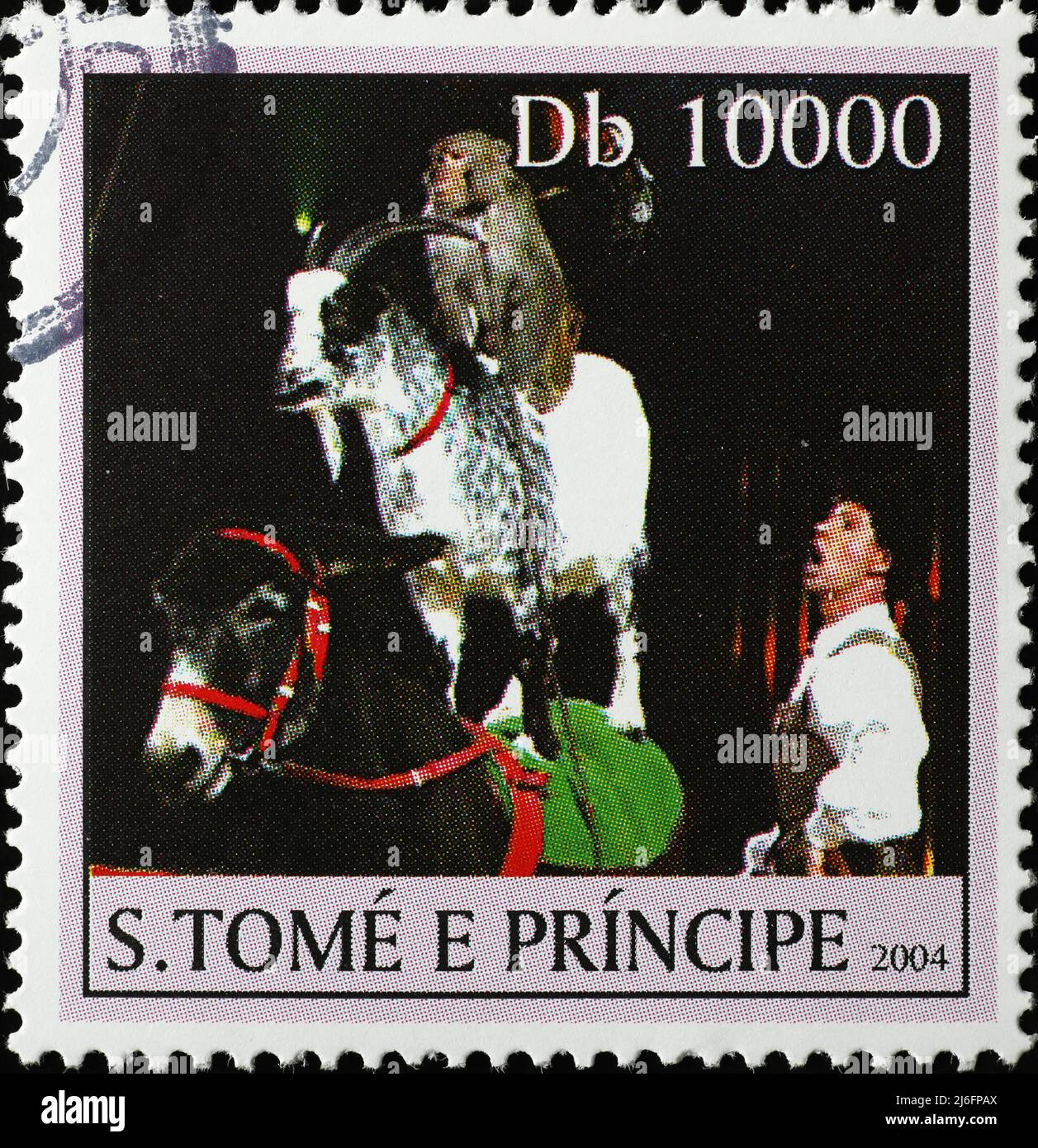 Bild von trainierten Tieren im Zirkus auf Briefmarke Stockfoto