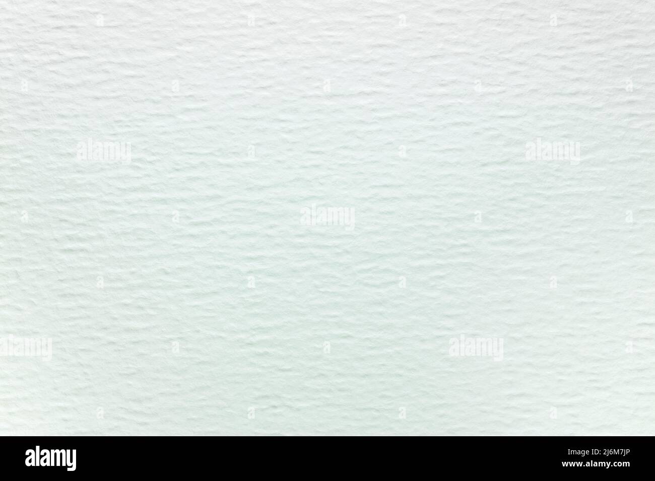 Weißer rauer Aquarellpapier-Hintergrund mit sehr detaillierter Textur. Makroansicht. Stockfoto