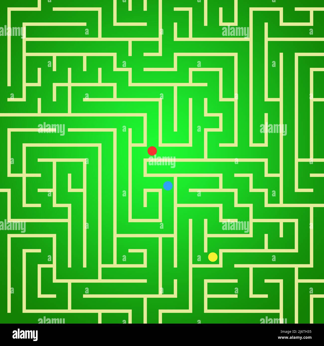 Grünes Labyrinth mit einem roten Punkt darin Stockfoto