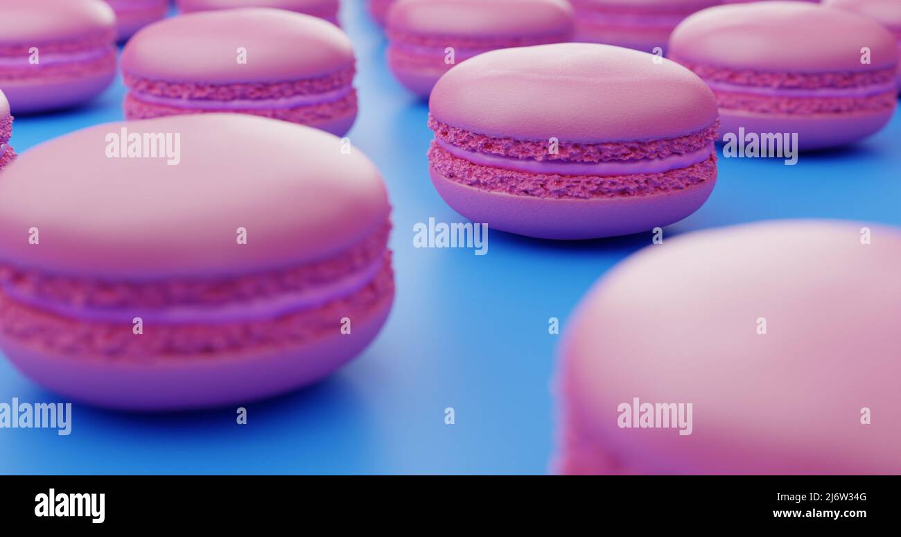 Nahaufnahme von pastellrosa Macarons, die in Linien auf blauem Hintergrund verteilt sind. Pastellfarben. Elegantes Essenskonzept. 3D Darstellung rendern Stockfoto