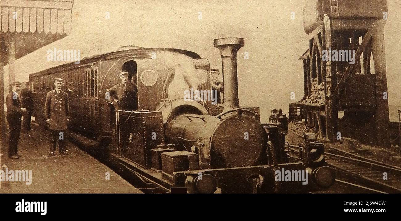 Ein viktorianisches Foto einer Dampfeisenbahn-Lokomotive und eines Stabes auf der Londoner Millwall-Verlängerungslinie, London. Stockfoto