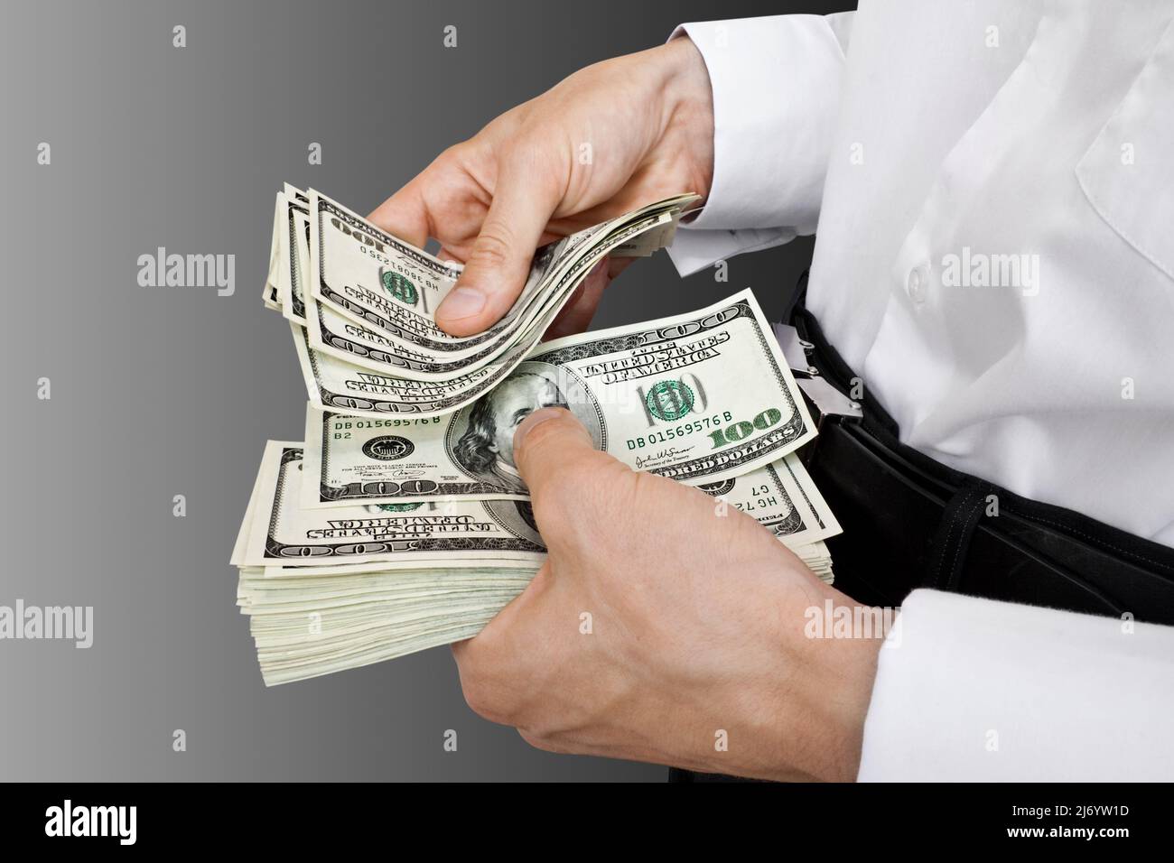 Geschäftsmann zählt Geld Dollar in den Händen. Geschäftskonzept Stockfoto