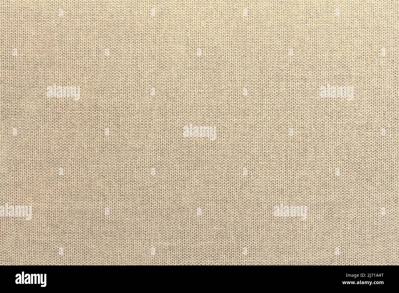 Beige Baumwolle gewebte Sofa Kissen Stoff Textur Hintergrund. Hochauflösende Fotografie Stockfoto