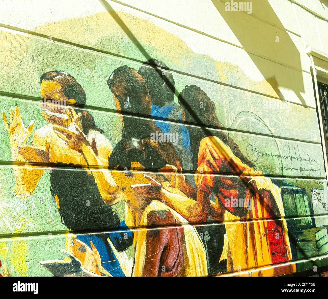 Wandgemälde mit einer Gruppe von Frauen an der Wand des Gartens Colegio de Santo Domingo de Vistillas. Realejo, Granada, Andalusien, Spanien Stockfoto