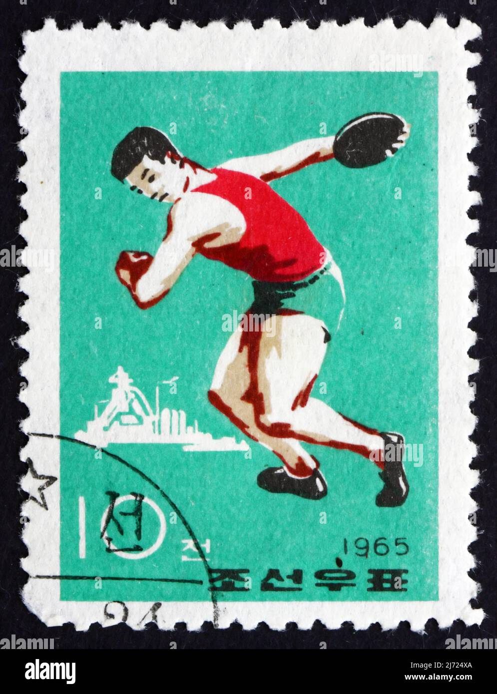 NORDKOREA - UM 1965: Eine in Nordkorea gedruckte Marke zeigt Discus Throw, Sport, um 1965 Stockfoto
