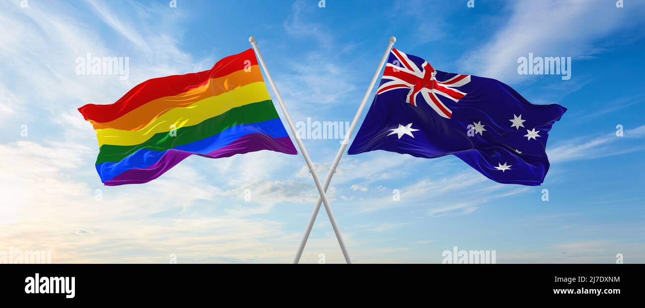 Zwei gekreuzte Fahnen LGBT Pride und Australien winken im Wind bei bewölktem Himmel. Konzept der Beziehung, des Dialogs, des Reisens zwischen zwei Ländern. 3D illust Stockfoto