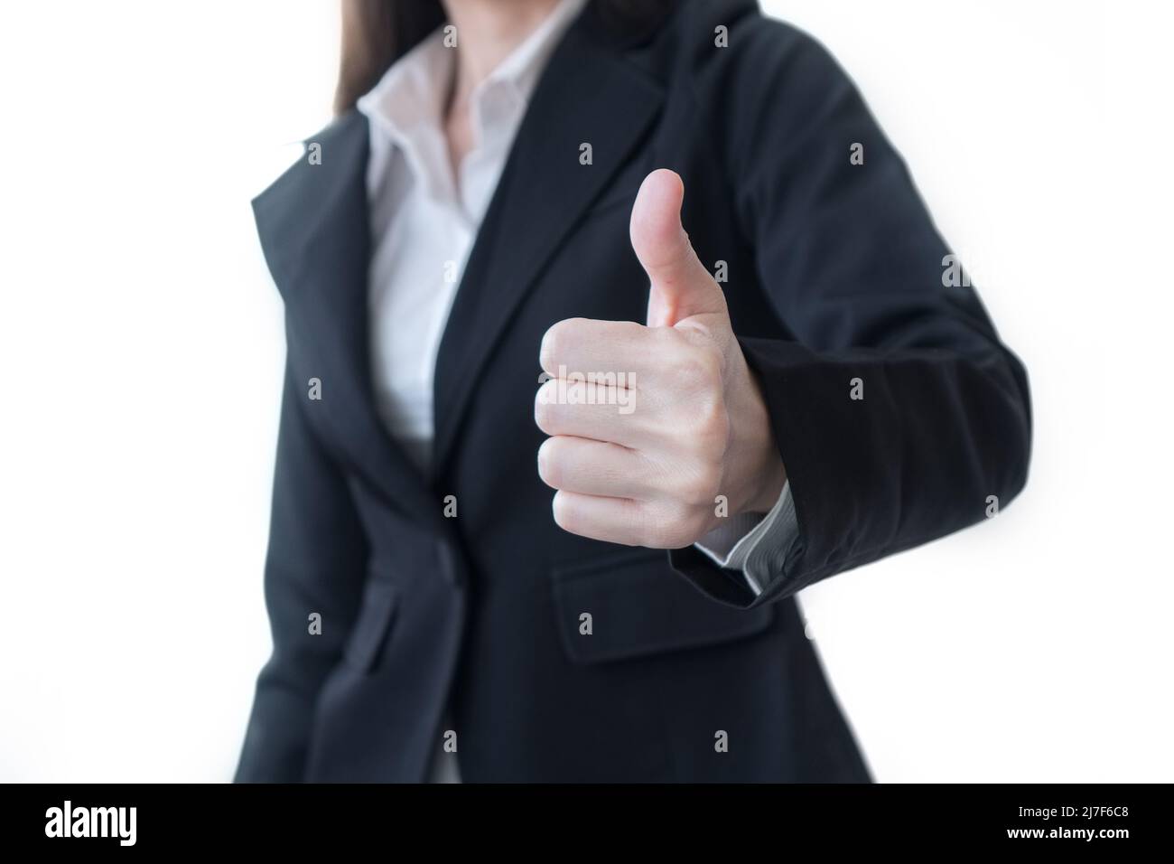 Eine Geschäftsfrau, die eine Geste zeigt, isoliert auf weißem Hintergrund. Stockfoto