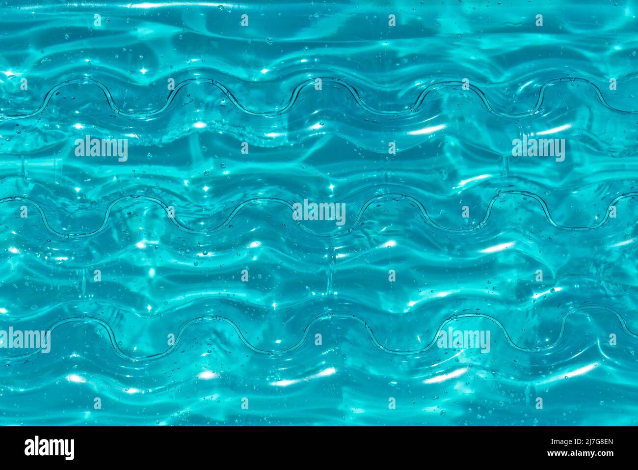 Textur der aufblasbaren Aqua Farbe Matratze auf dem Wasser Stockfoto