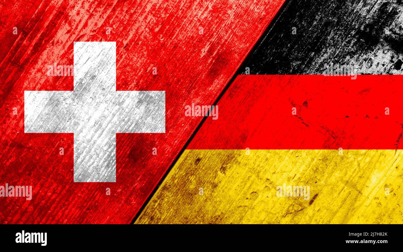 Flaggen der Schweiz und Deutschlands auf den Tafeln. Stockfoto